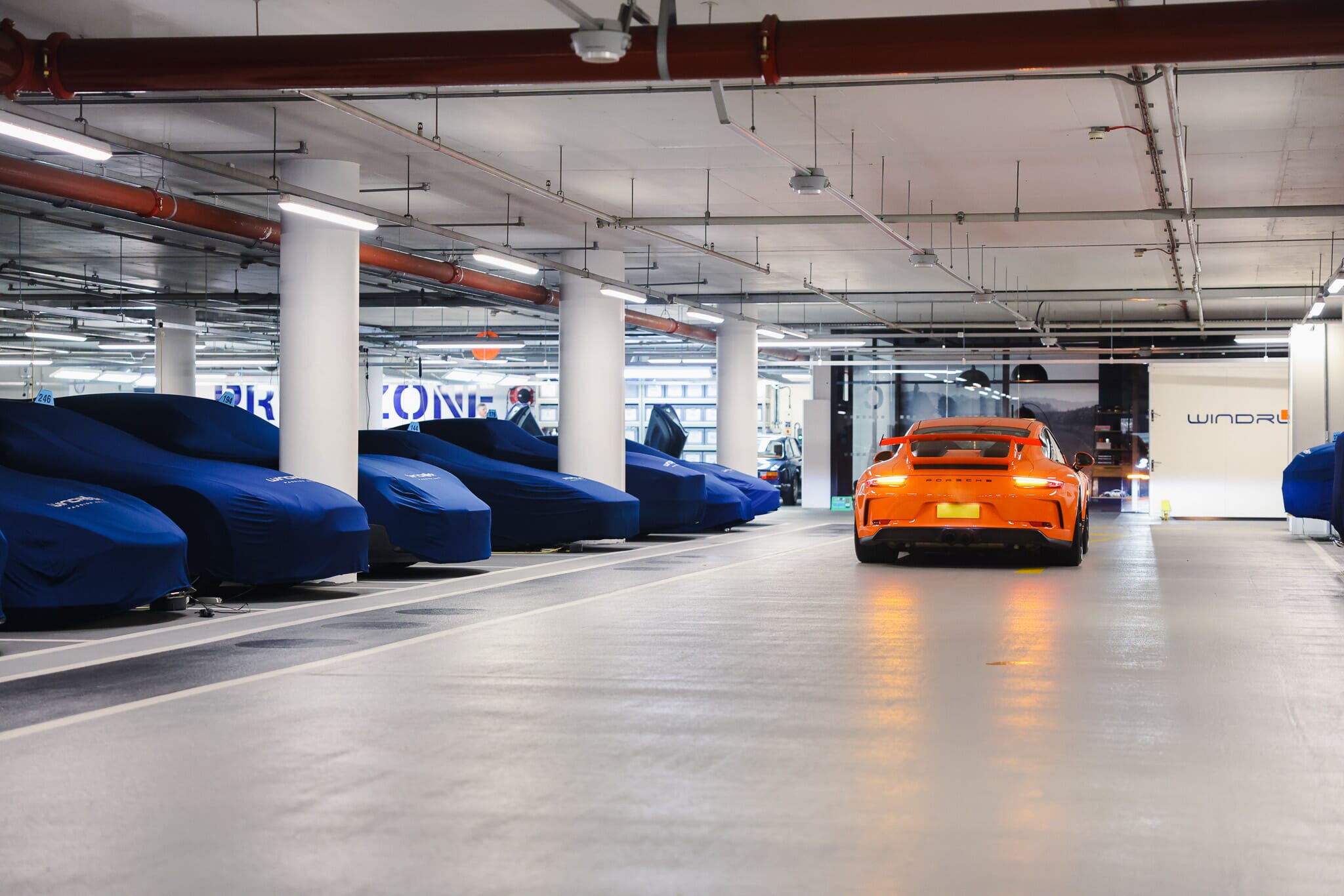 A car being exercised in car storage